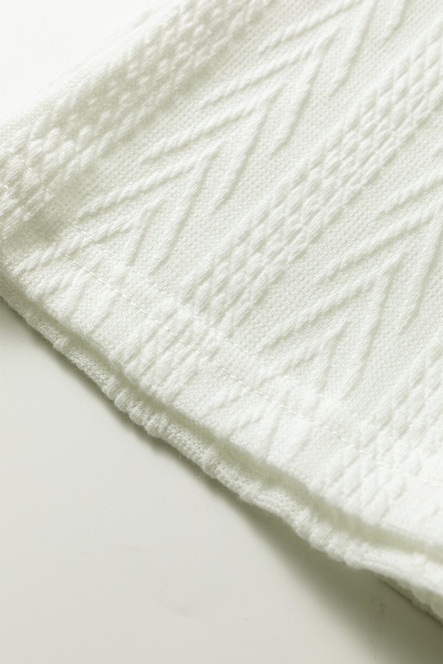 White Floral Patchwork Textured Knit Drawstring V Neck Blouse