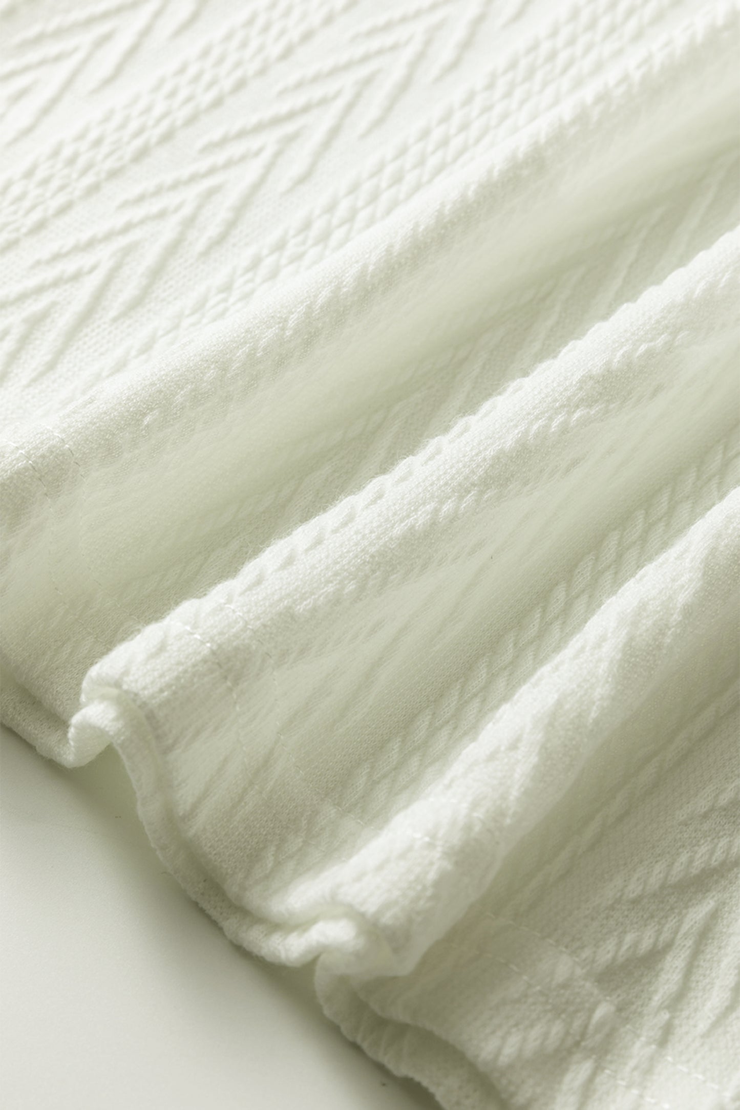 White Floral Patchwork Textured Knit Drawstring V Neck Blouse