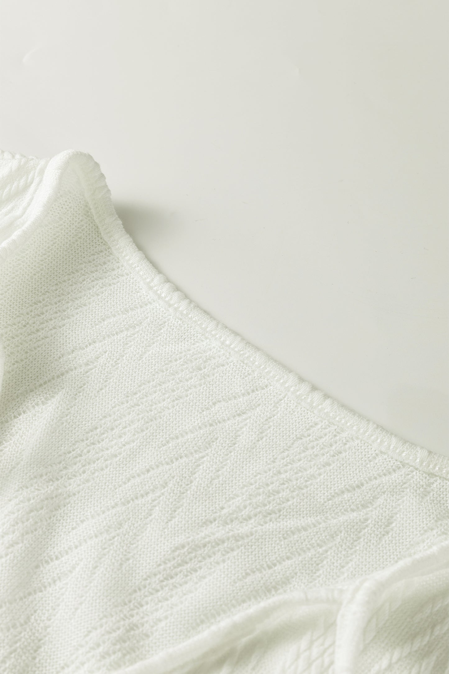 White Floral Patchwork Textured Knit Drawstring V Neck Blouse